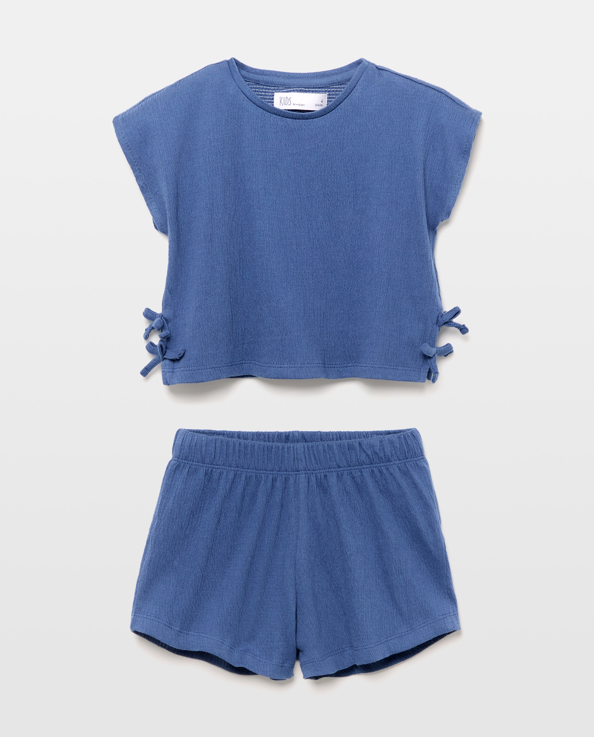 Imagen 4 de Conjunto corto de niña tejido wrinkled con lazos laterales - Kids El Corte Inglés - 400 Azul 400 Azul