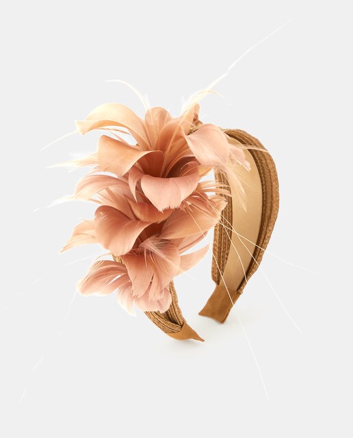 Imagen 0 de Tocado tipo diadema con red y plumas de rafia