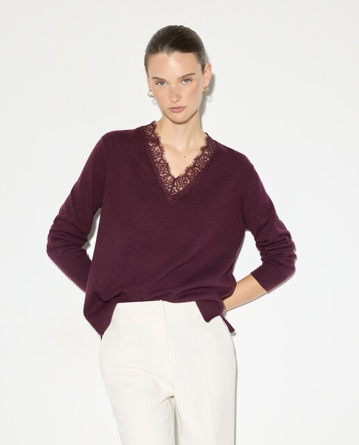 Imagen 0 de Jersey liso con cuello pico de mujer