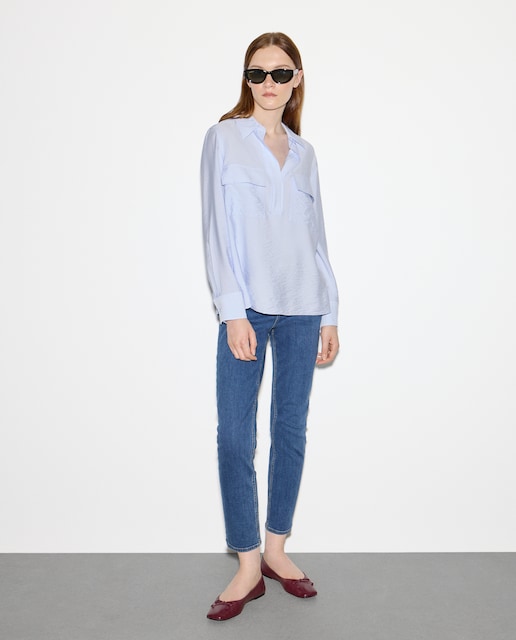 Imagen 0 de Pantalón vaquero liso de algodón de mujer