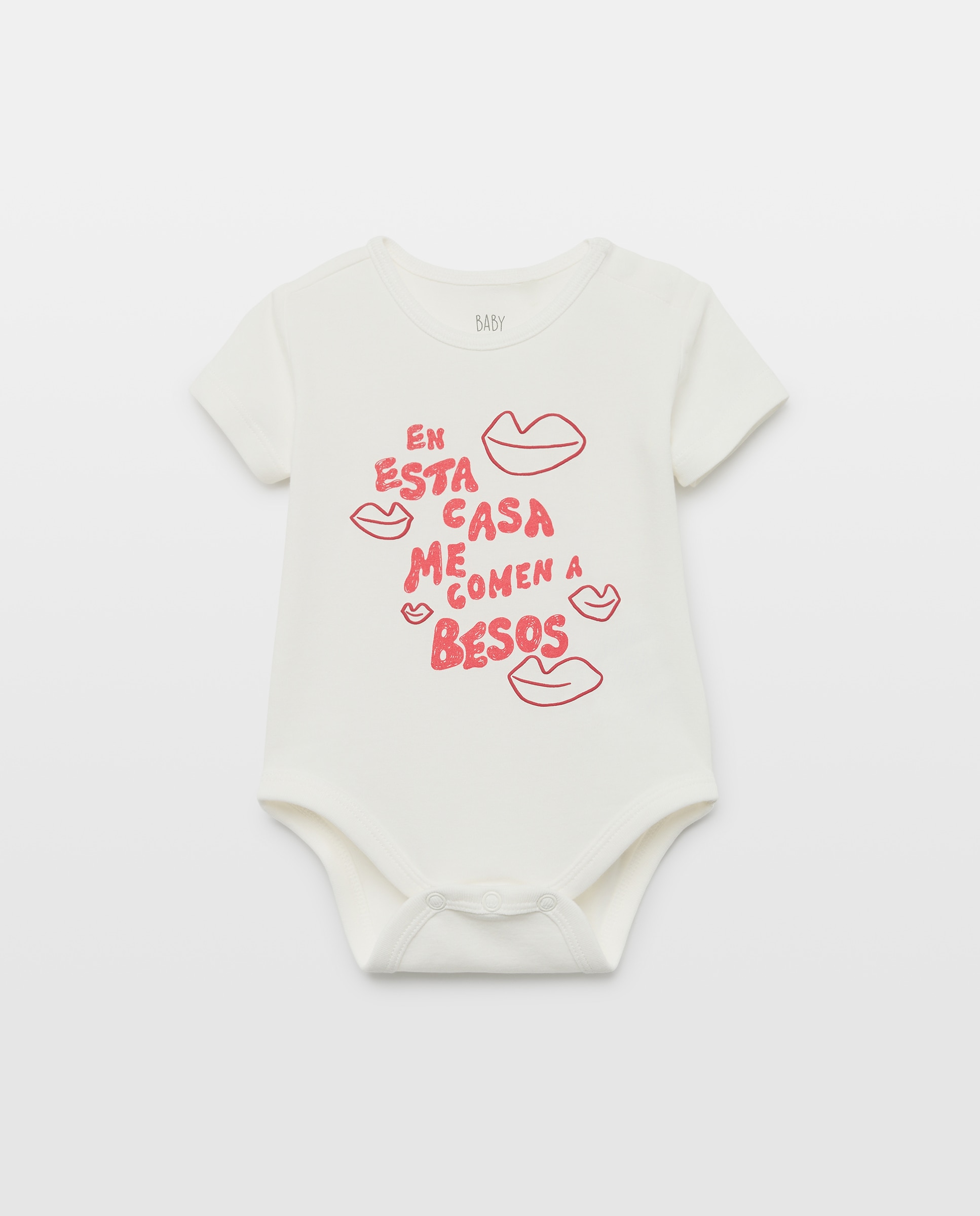 Imagen 1 de Body de bebé con mensaje "en esta casa me comen a besos " Blanco roto