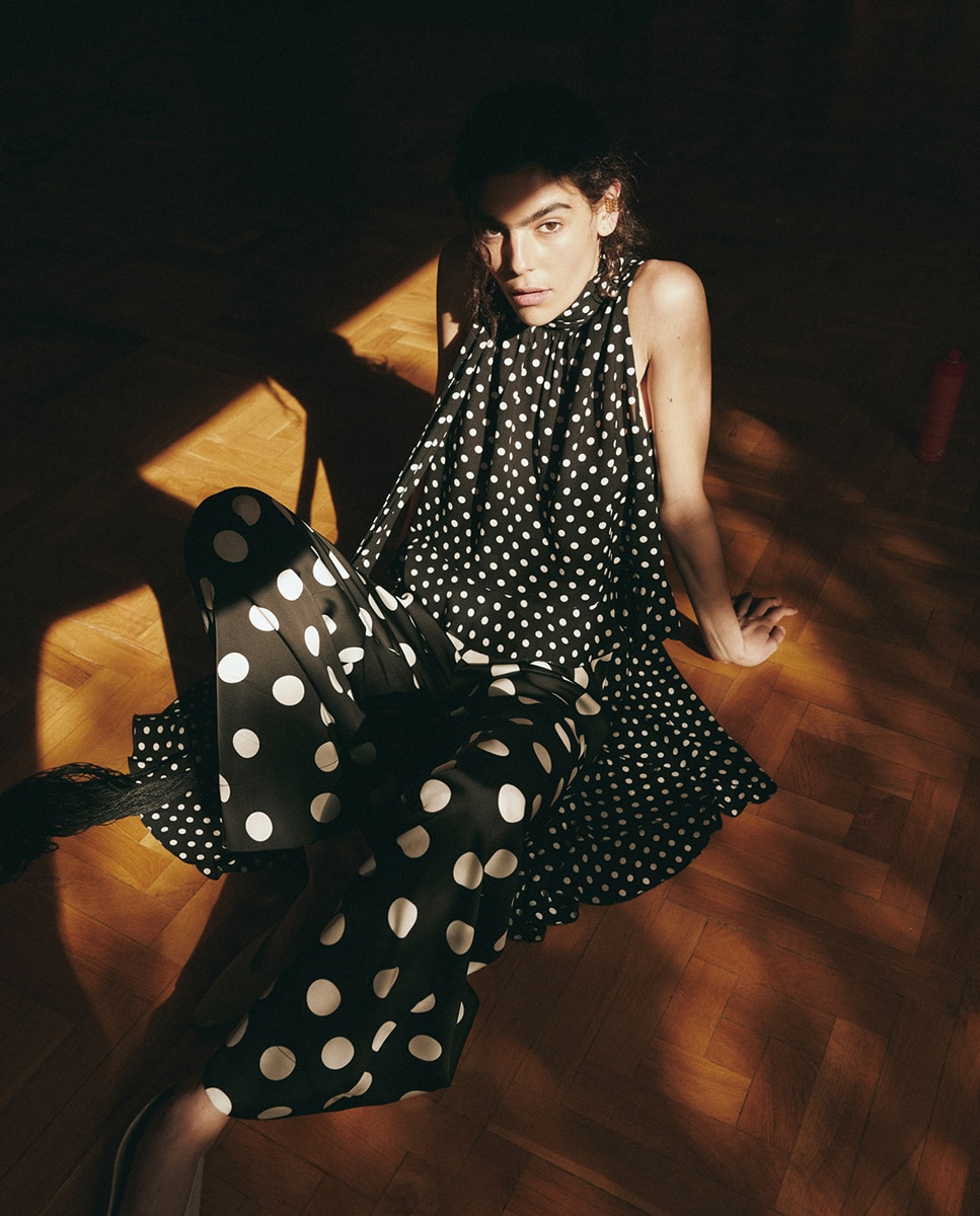 Imagem 0 de Calças Flare às Bolinhas