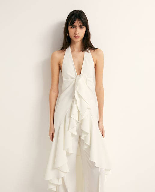 Imagen 0 de Top capa volantes