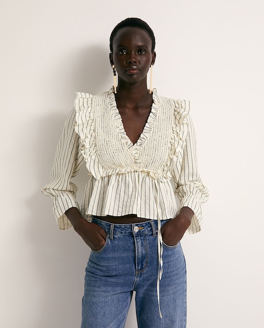 Imagen 0 de Blusa gomas volante