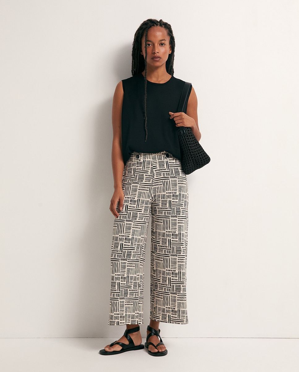 Sfera - Pantalón fluido estampado.