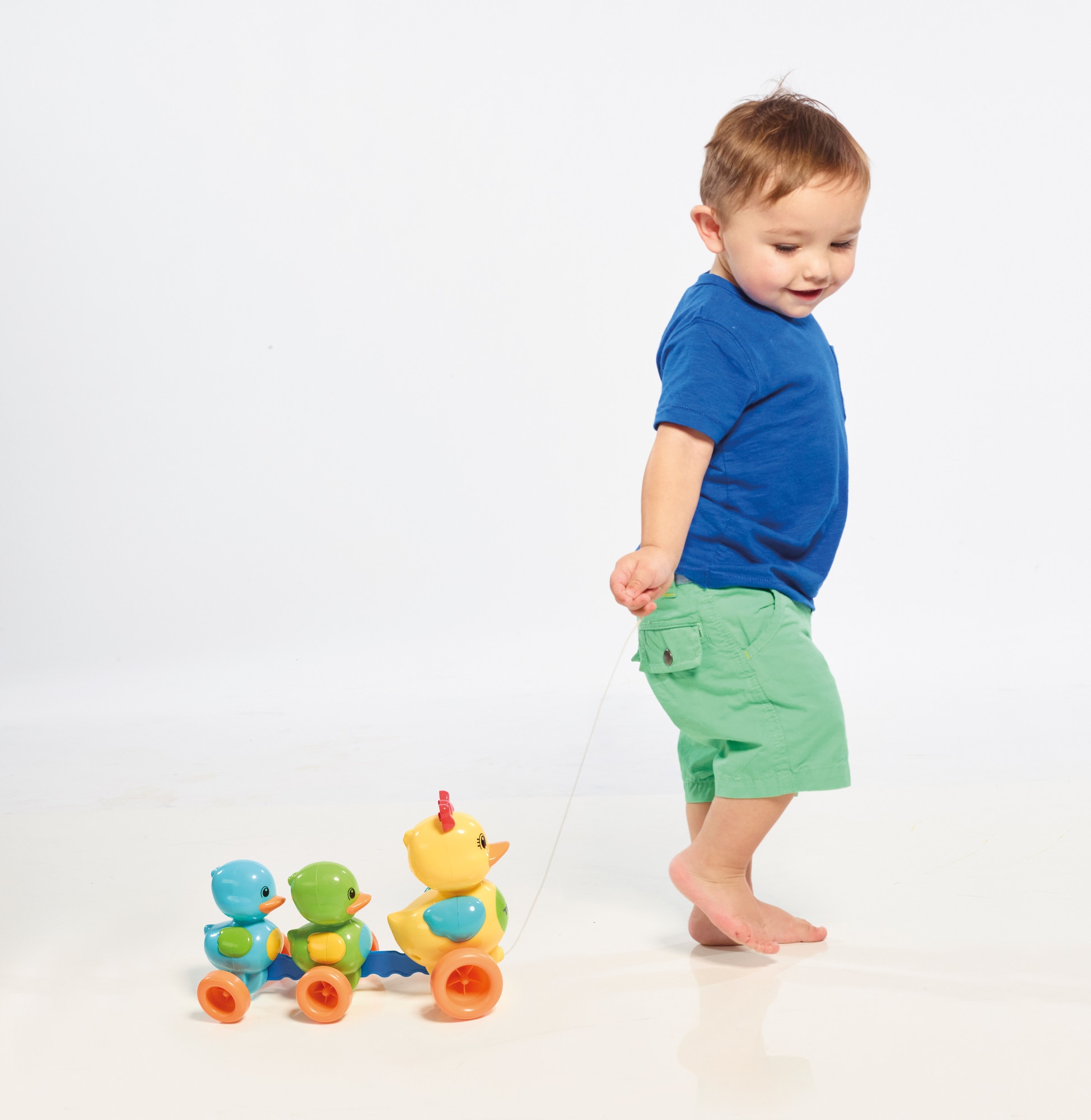 Juguete de Arrastre familia patitos Tomy Toomies 4