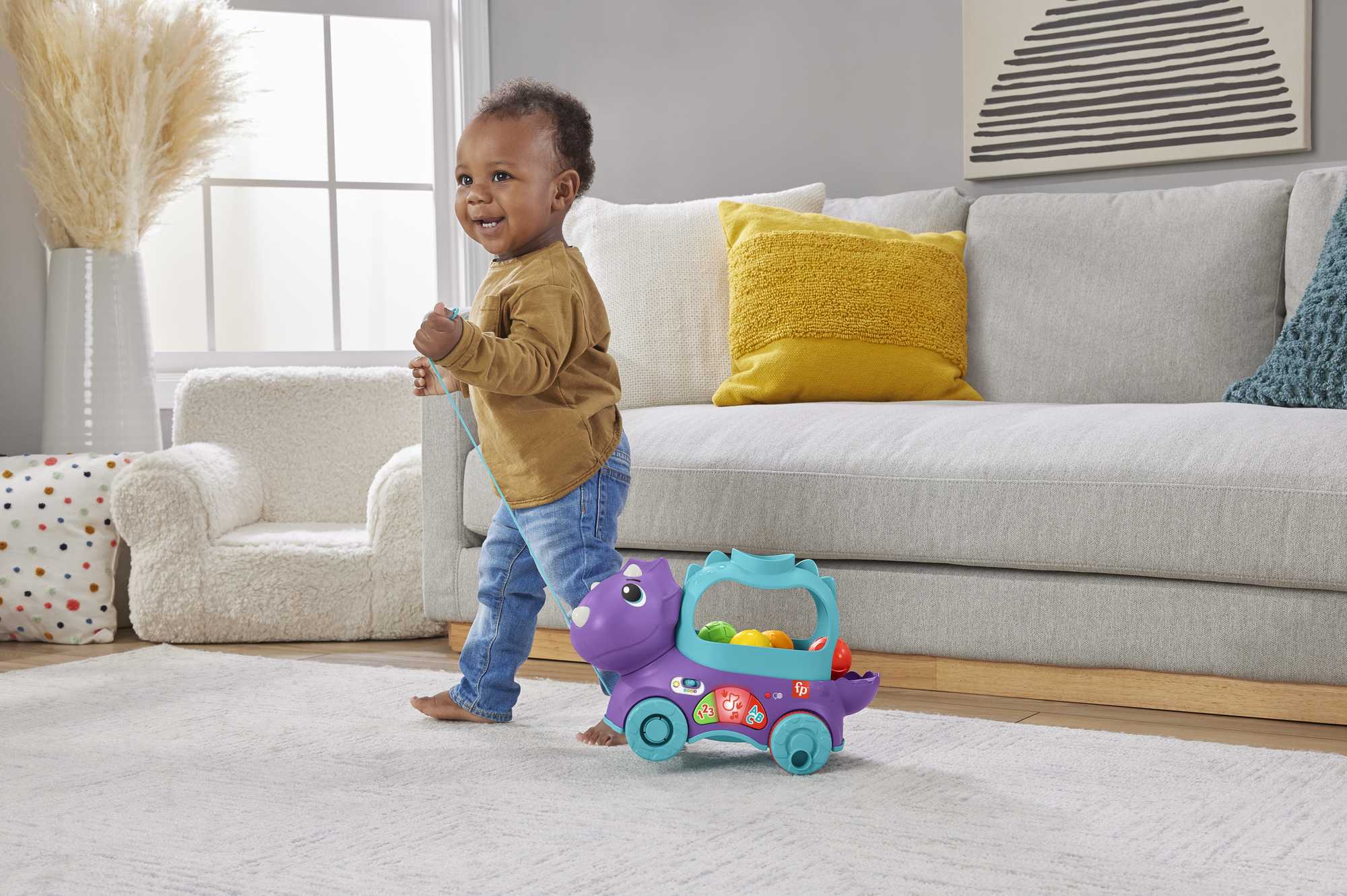 Dinosaurio de juguete de arrastre con bolas, luces y sonidos Fisher-Price 6