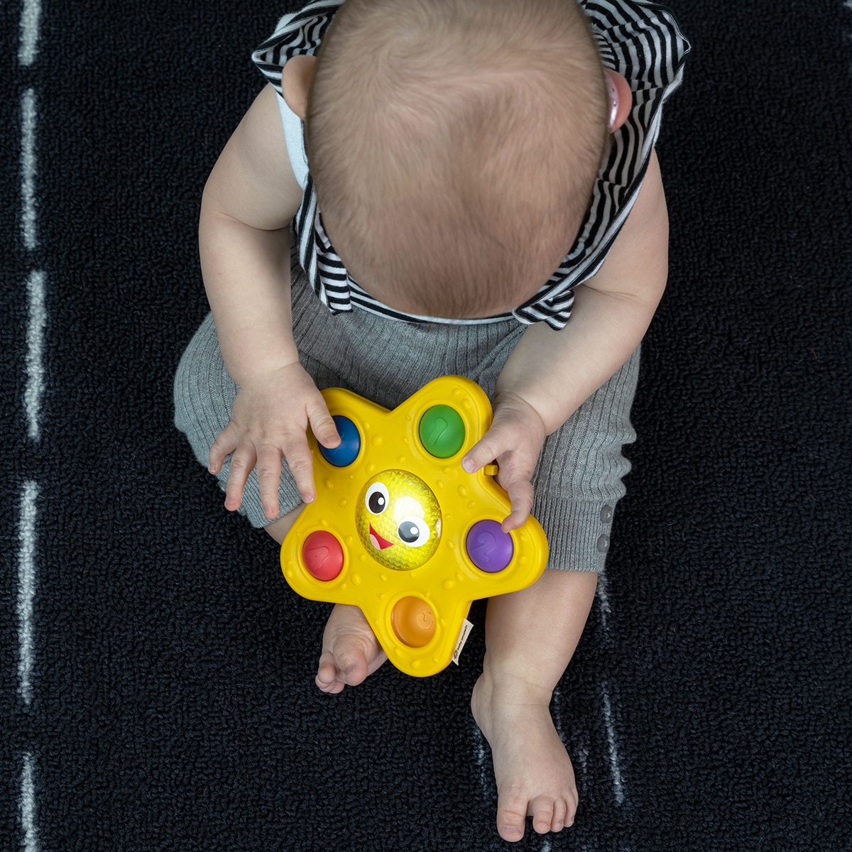 Juguete sensorial de actividades Pop & Glow Starfish Baby Einstein 10