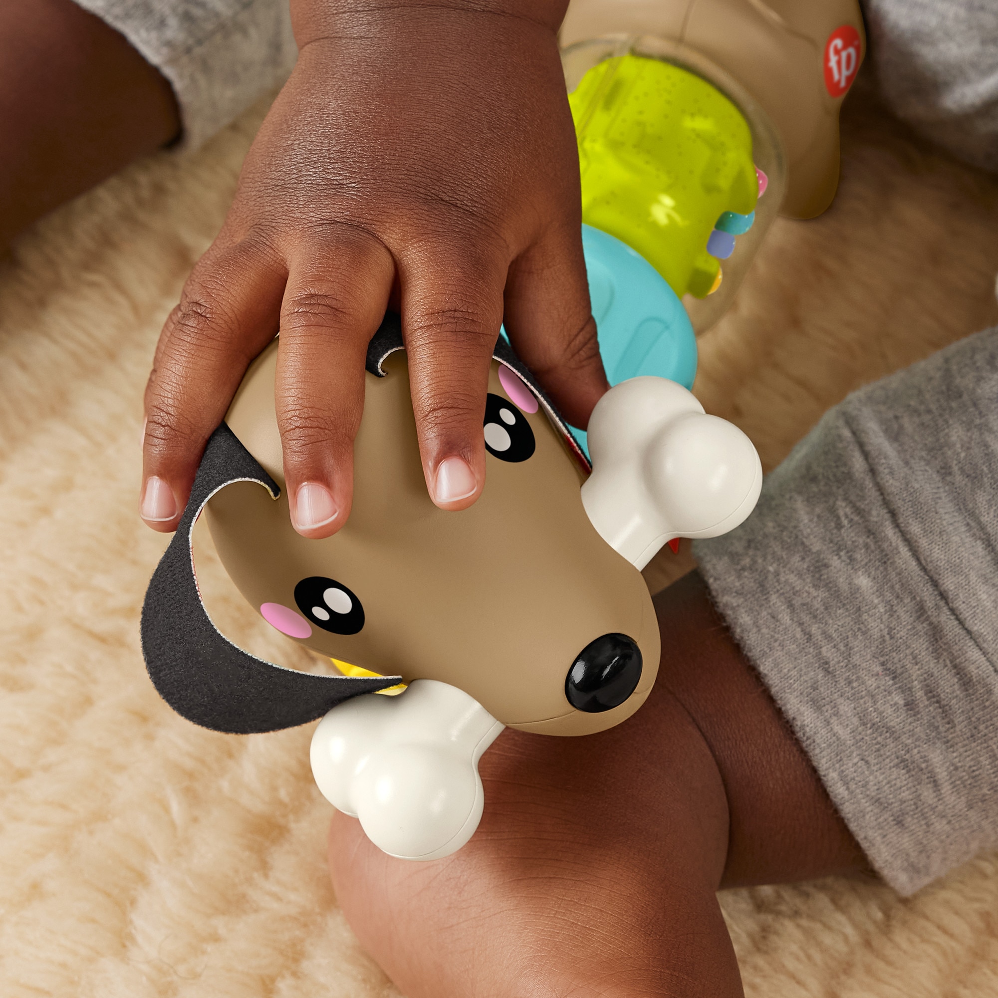 Perrito de actividades con sonidos y giros Fisher-Price 4
