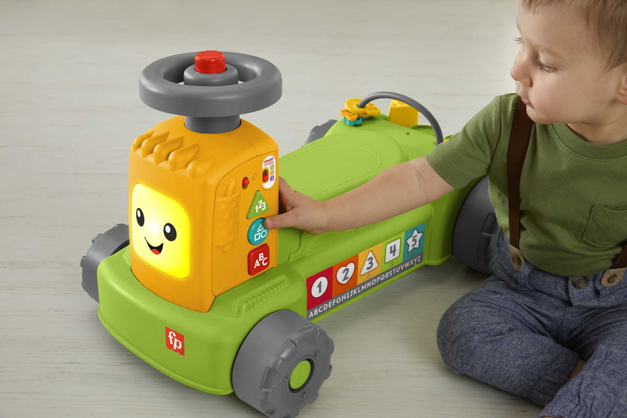 Correpasillos transformable con luces y sonidos Ríe y aprende Tractor 4 en 1 Fisher-Price 4
