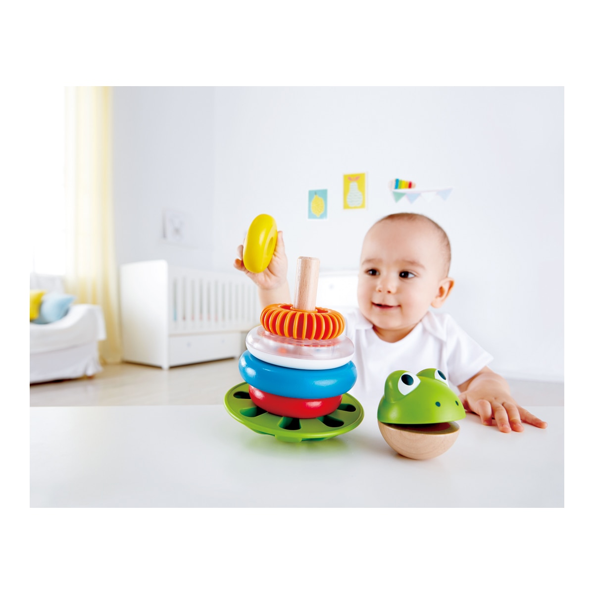 Aros apilables sr. Rana juguete de madera Hape 3