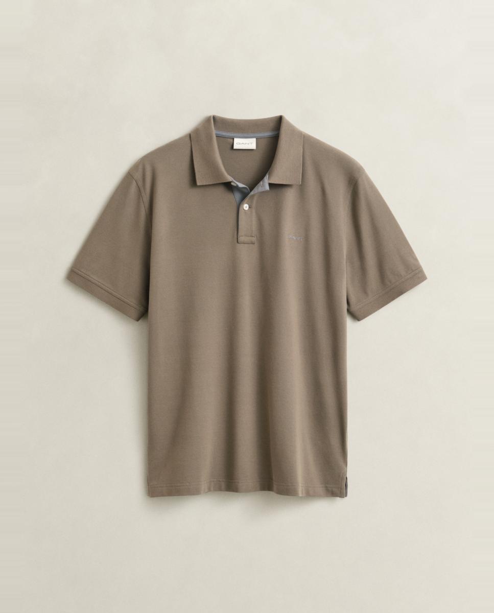 Imagen 0 de Polo de hombre de estampado liso y contraste de colores en la zona interior tallas grandes Marrón