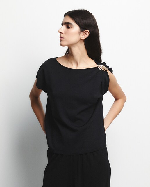 Imagen 0 de Top aplique dorado