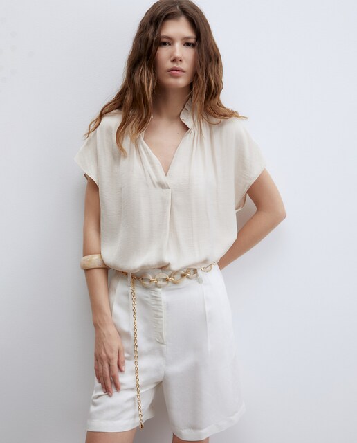 Imagen 0 de Blusa volante cuello