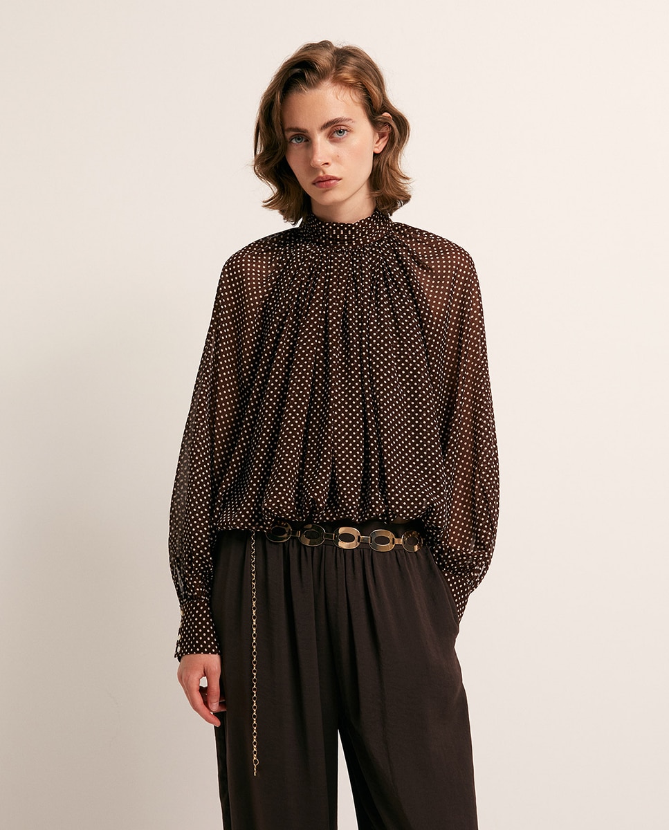 Imagem 0 de Blusa às Bolinhas Ensacada