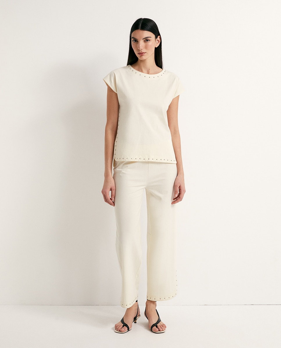 Sfera - Pantalón tachas.