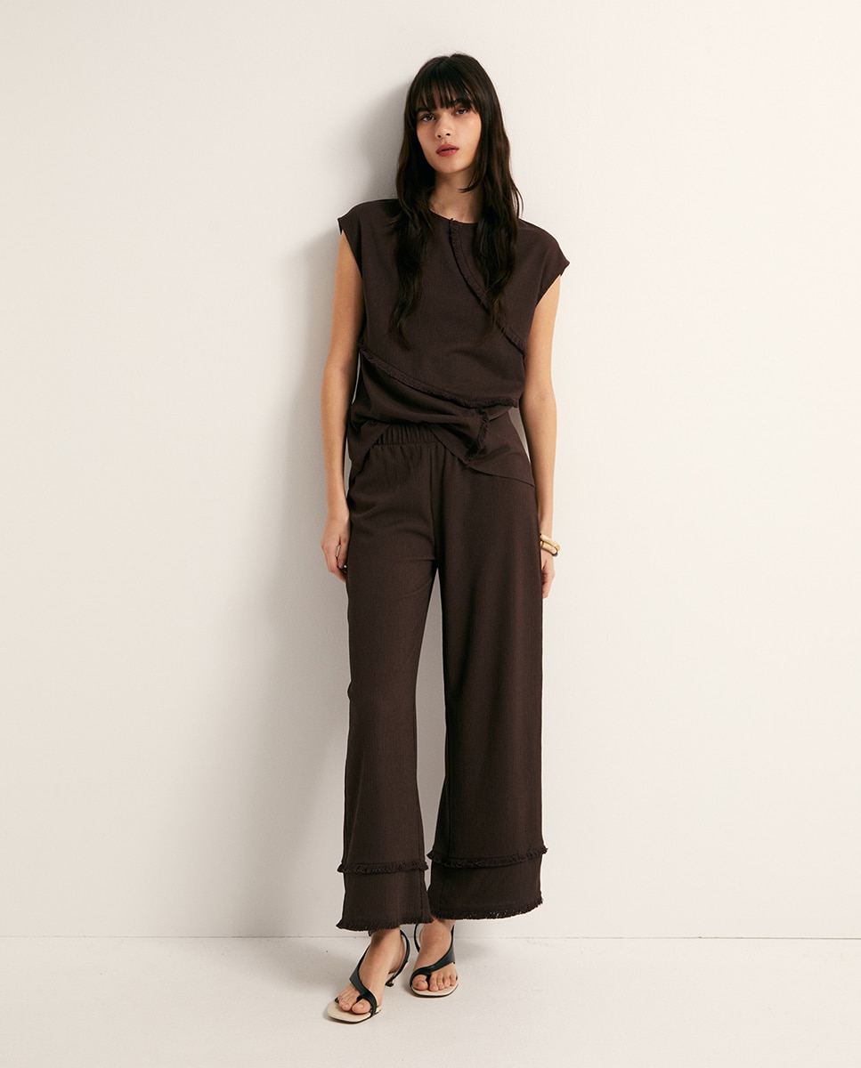 Imagem 0 de Calças com Textura e Franjas