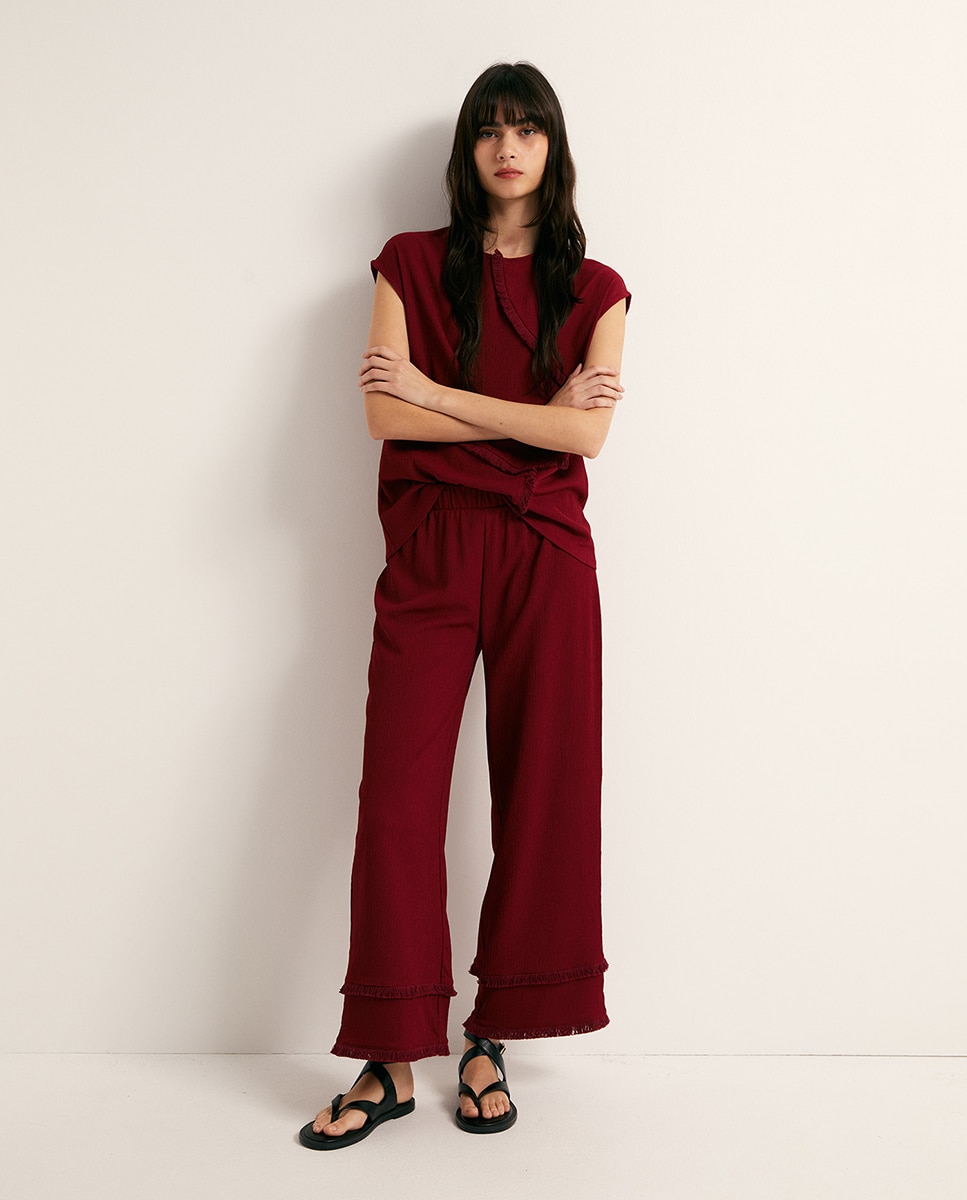 Imagem 0 de Calças com Textura e Franjas