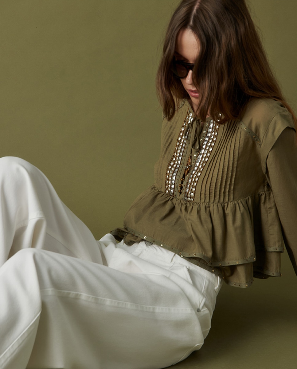 Imagem 0 de Blusa com Tachas