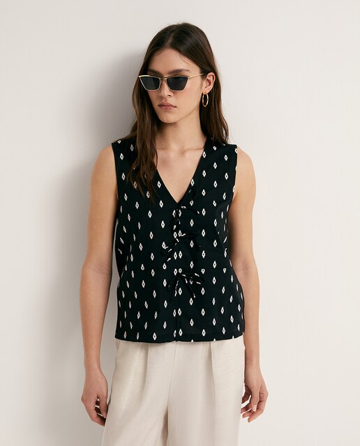 Imagen 0 de Camiseta bordado lazadas