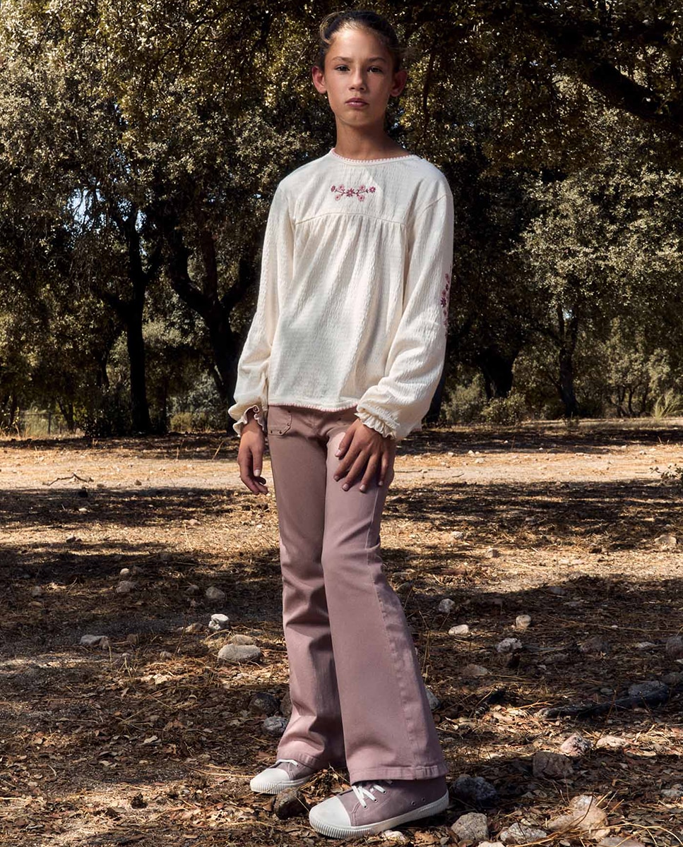 Imagen 0 de Pantalón flare tachas