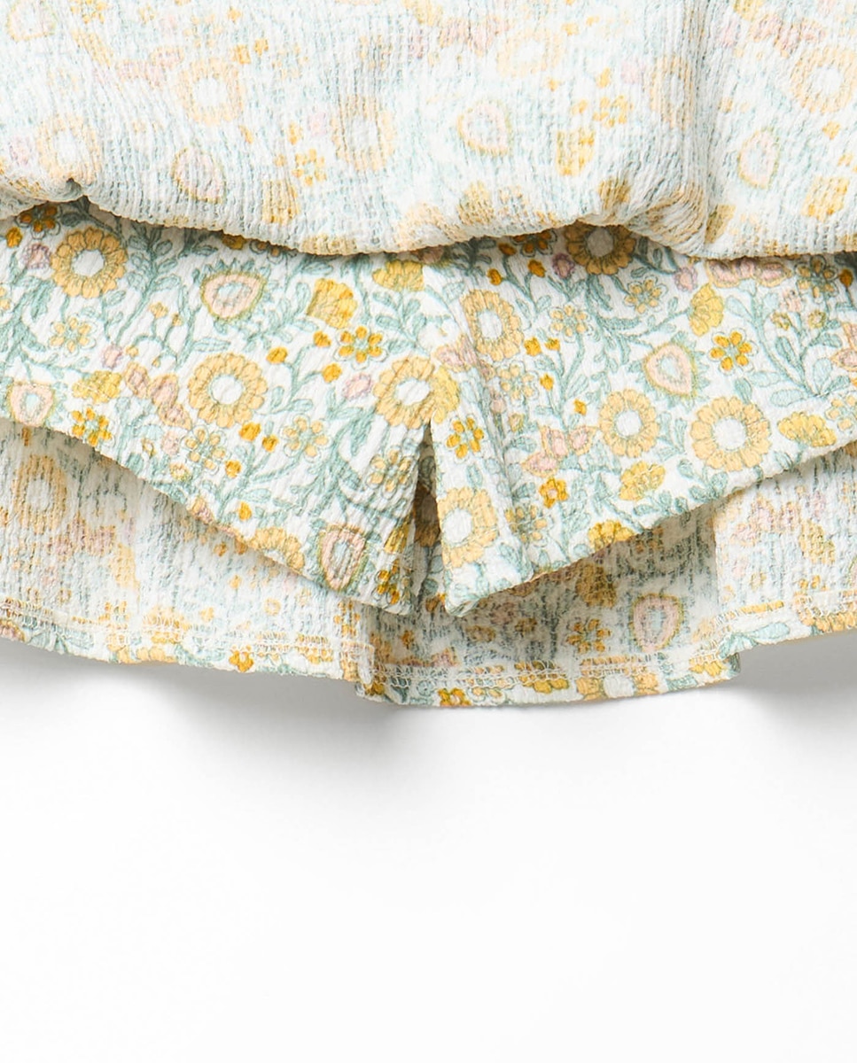 Saia-calça com folhos Sfera Cru-4