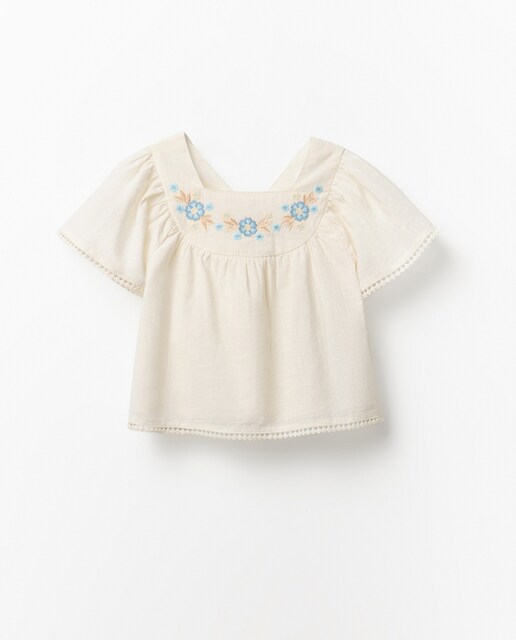 Imagem 0 de Blusa com peça superior bordada