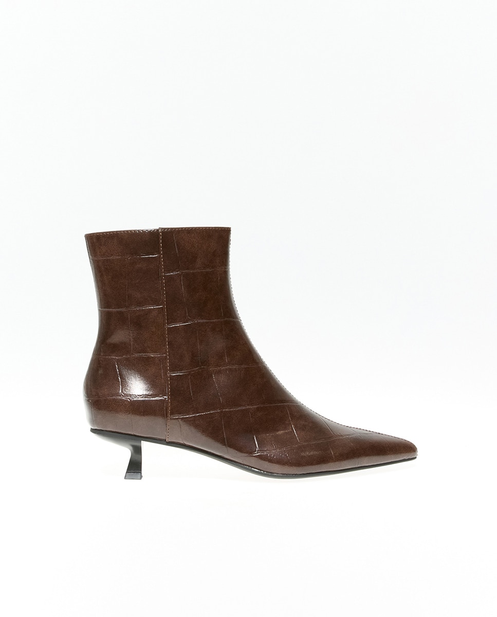 Imagem 0 de Botins com Biqueira Croco