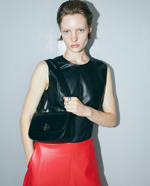 Imagen 0 de Bolso rígido broche