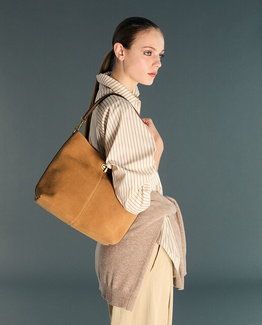 Imagem 0 de Mala Hobo em Pele com Fecho Metálico