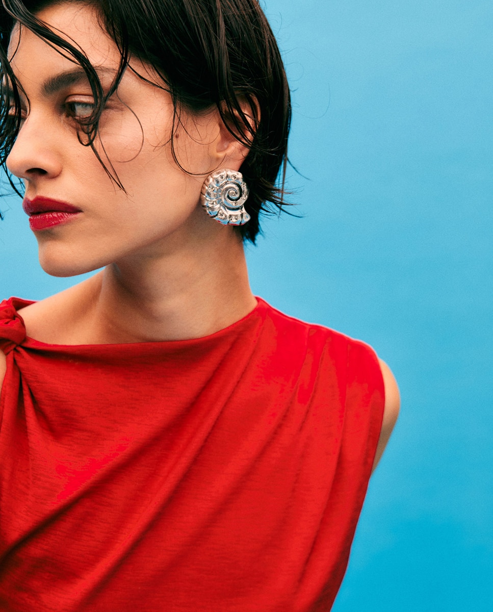 Imagen 0 de Pendientes caracolas brillos
