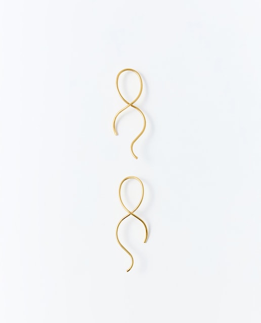 Imagen 0 de Pendientes lazada baño de oro