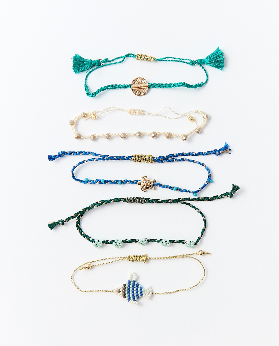 Imagem 0 de Pulseiras com Cordões e Peixe