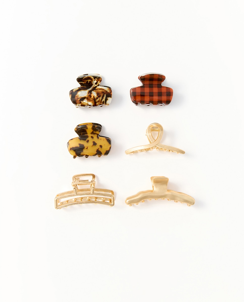 Imagen 0 de Set 6 mini pinzas metal carey