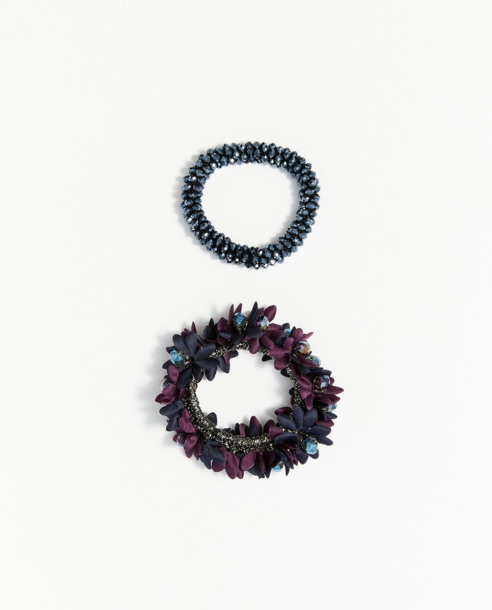 Imagen 0 de Set 2 gomas floral y brillos Negro