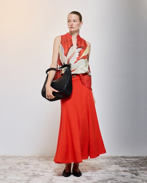 Imagen 0 de Falda midi lisa de mujer