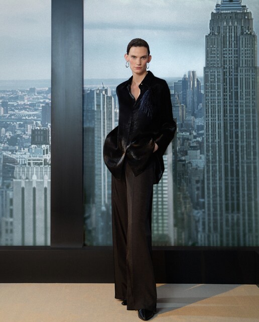 Imagem 0 de Calças Lisas Largas