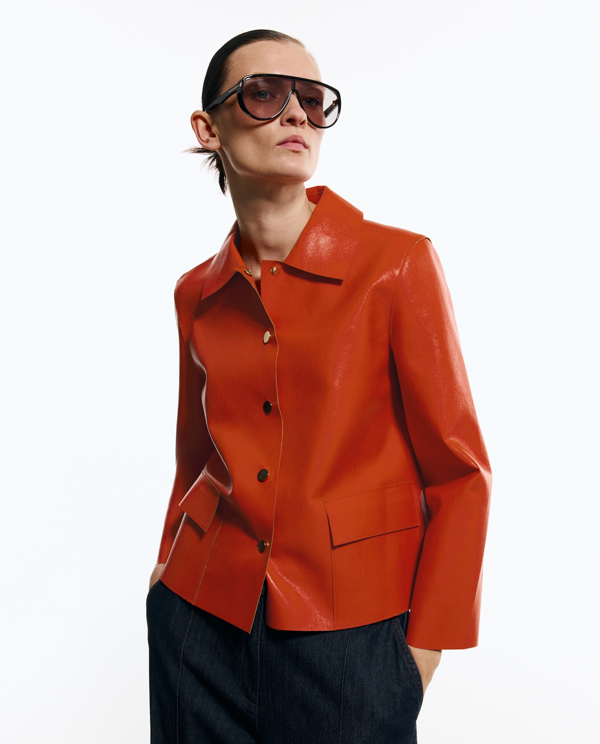 Imagem 0 de Casaco em Pele Vegana com Bolsos de Remendo