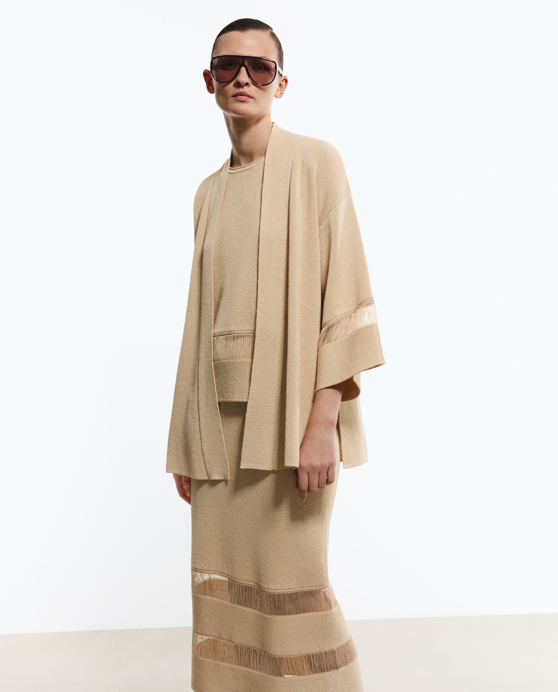 Woman Limited El Corte Inglés - Chaqueta de mujer con líneas verticales.