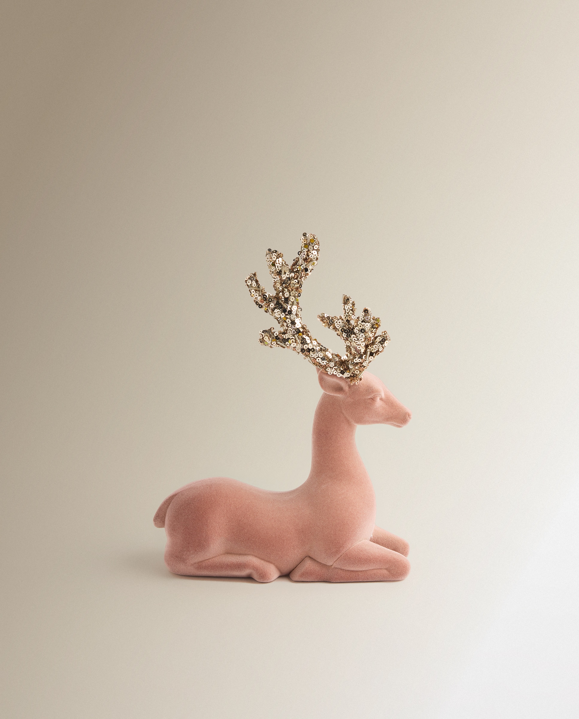 Imagen 2 de Figura Reno tumbado flocado glitter Navidad El Corte Inglés - Rosa Rosa