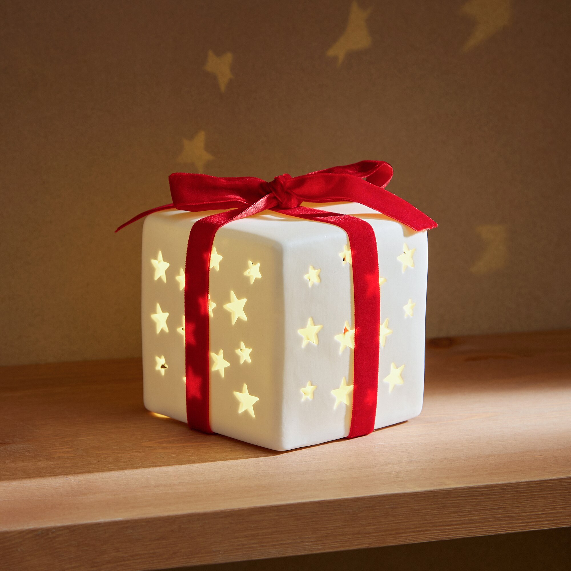 Imagem 0 de Figura Presente com Laço de Cerâmica com Luz LED Natal