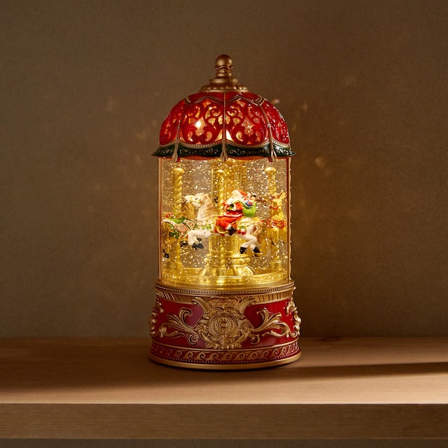 Imagen 0 de Bola de nieve Carrusel con luz LED, movimiento y música Navidad El Corte Inglés