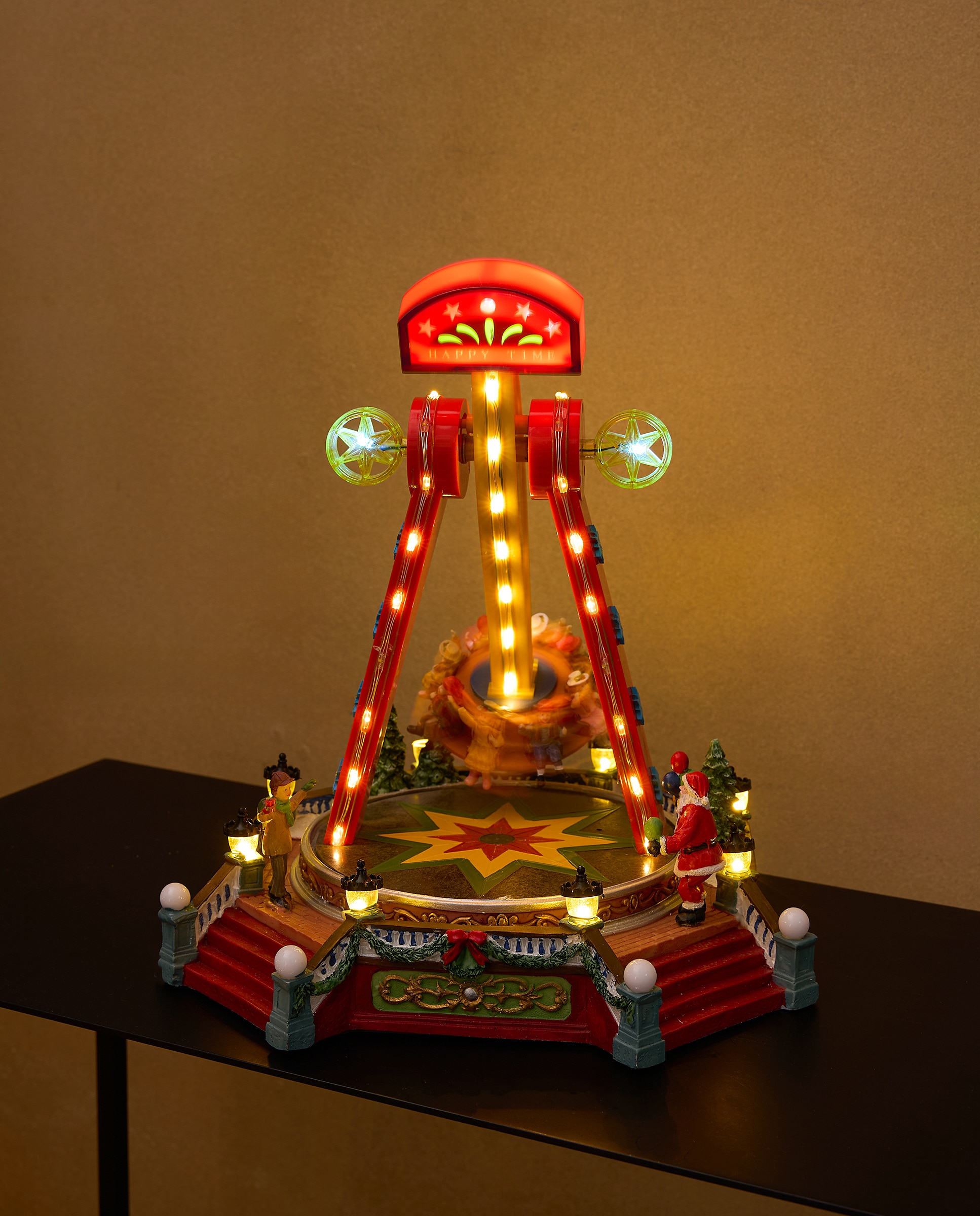 Imagem 0 de Atração Pai Natal com 68 Luzes LED, Música e Movimento Aldeia Natalícia em Miniatura