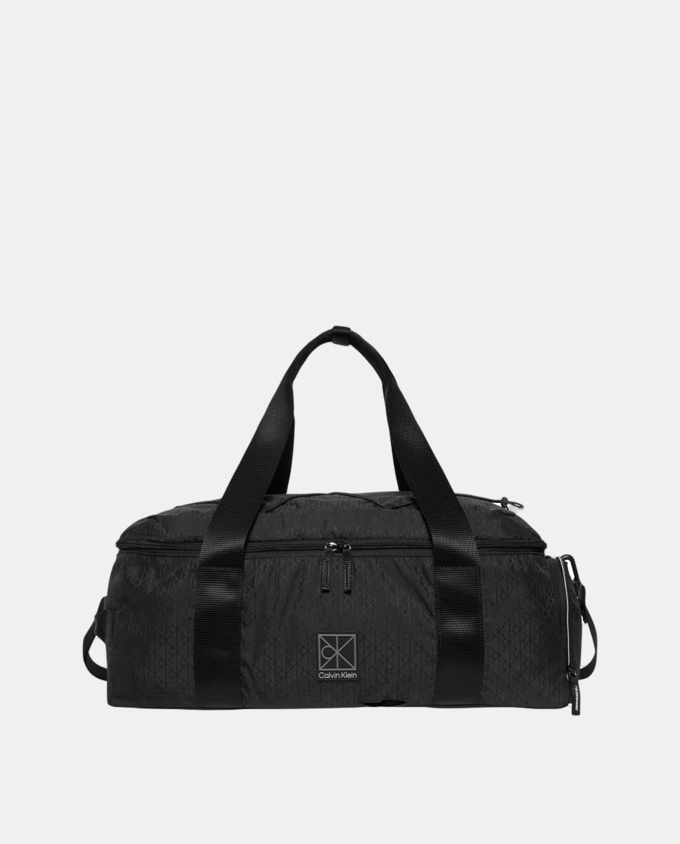 Imagen 0 de Bolsa de viaje Calvin Klein con estampado monogram Emblem en nylon Negro
