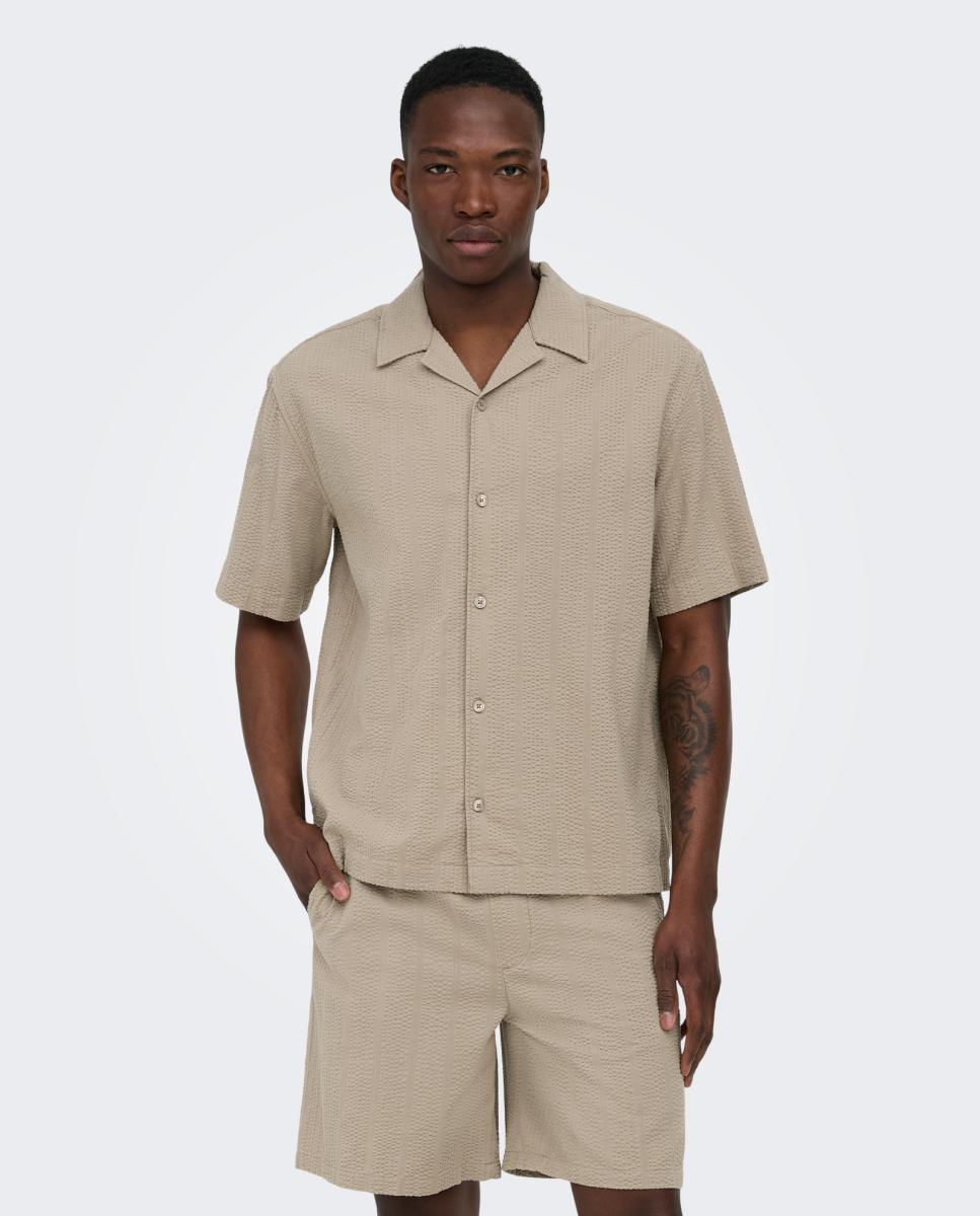Imagen 0 de Camisa seersuker de manga corta de hombre Beige