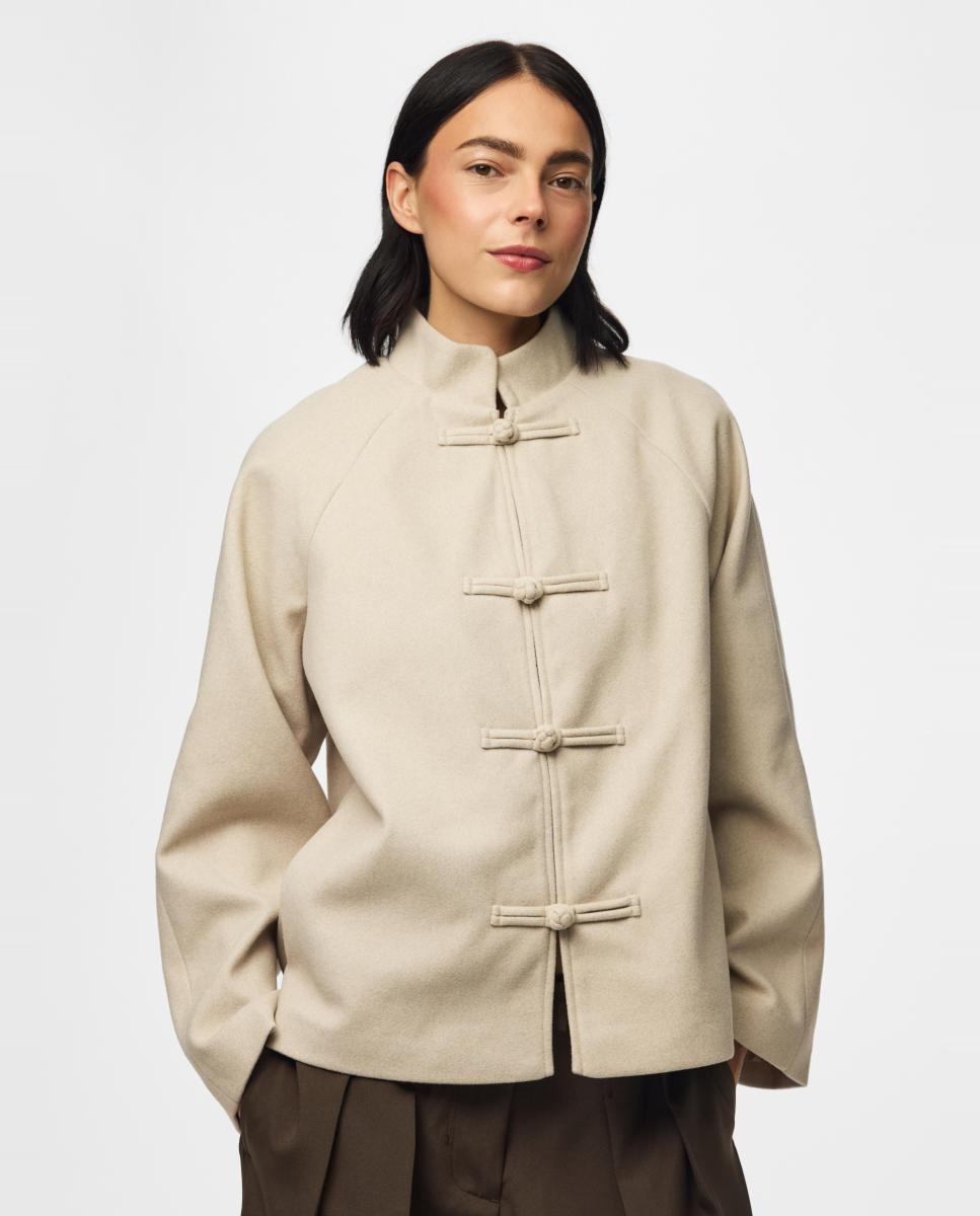Imagen 0 de Abrigo de mujer de paño Beige