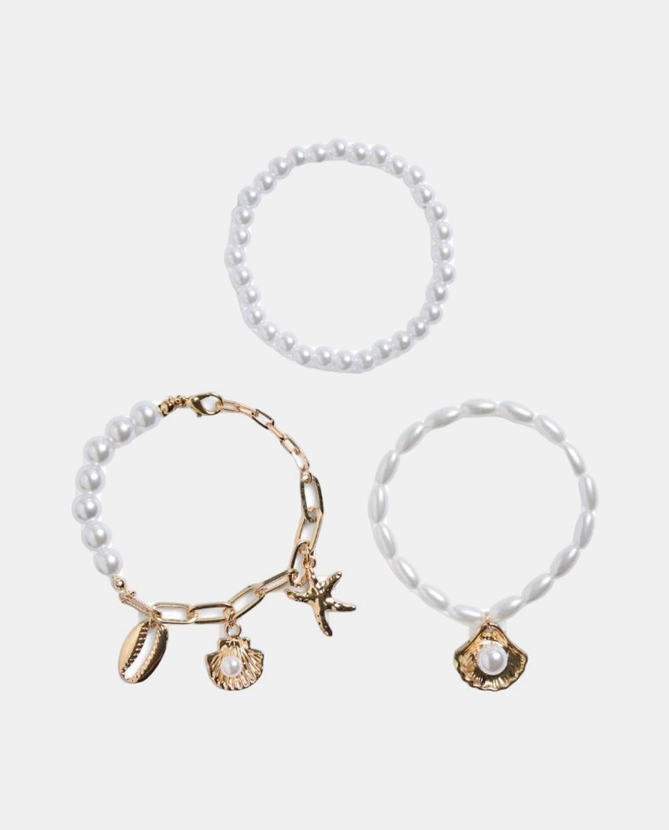 Imagen 0 de Pack de tres pulseras de perlas y charms dorados de mujer Amarillo