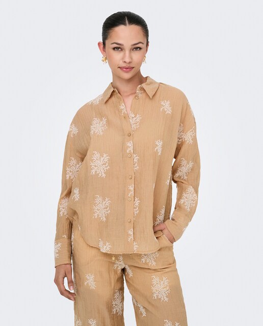 Imagem 0 de Camisa de mulher com manga comprida