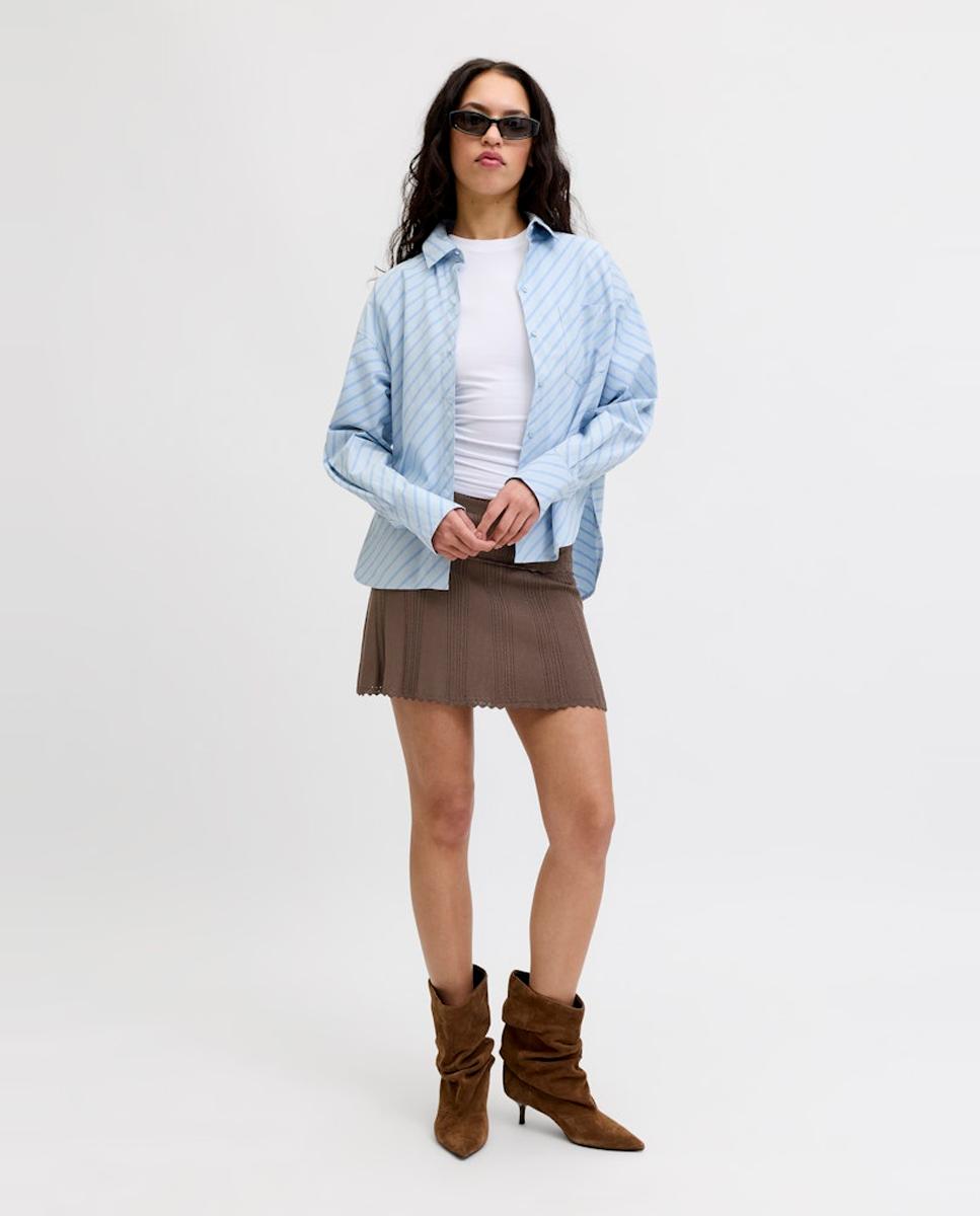 Jack & Jones - Falda corta de punto con cintura elástica y diseño plisado.