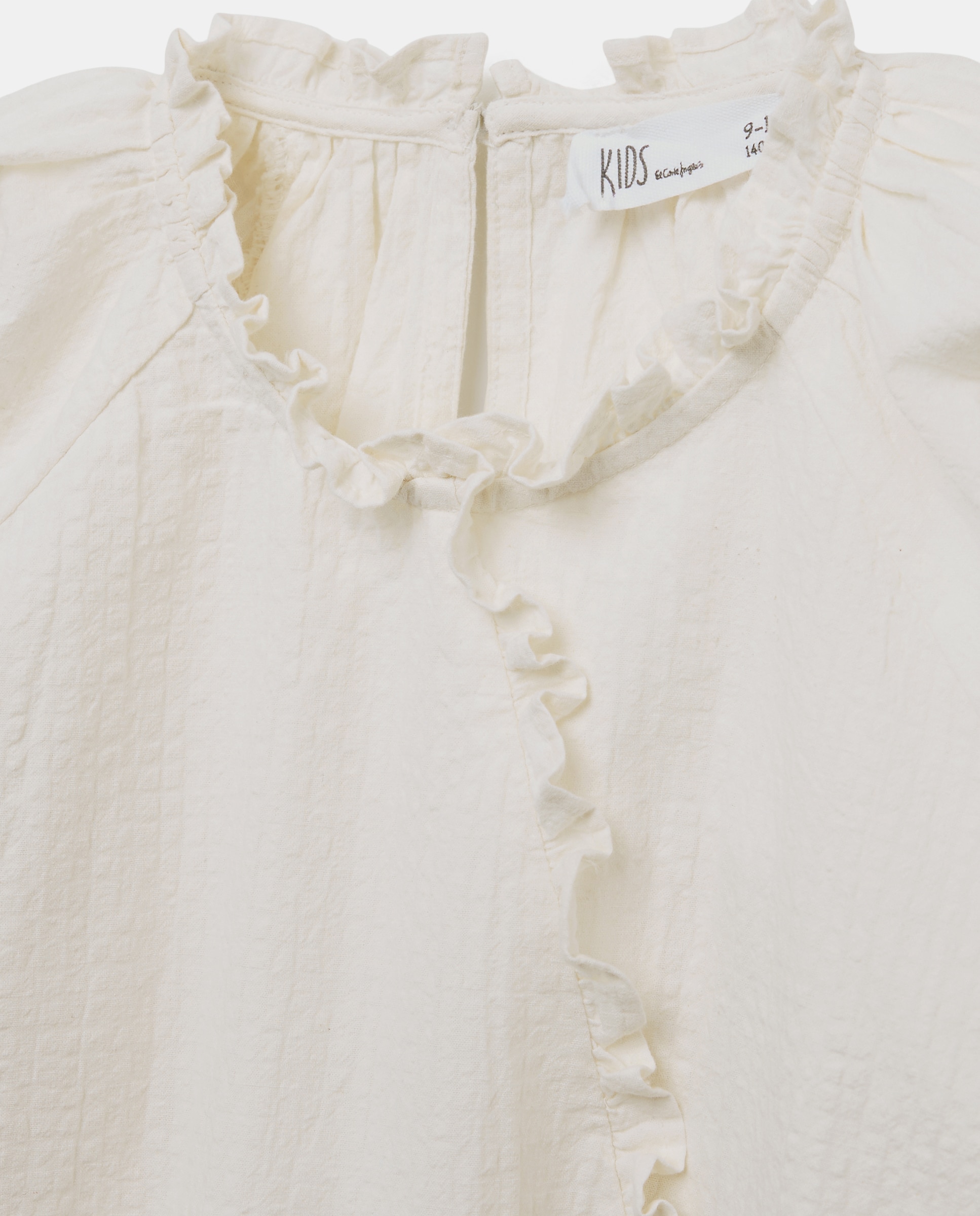 Imagen 2 de Blusa manga larga dobby con lurex cruzada y goma en bajo de niña - Kids El Corte Inglés - Blanco roto Blanco roto